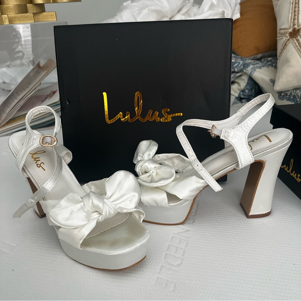 White satin bow platform heels